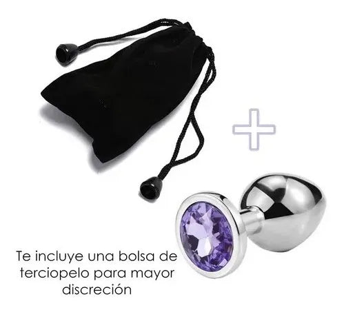 Plug anal chico con joya violeta junto a una bolsa negra.