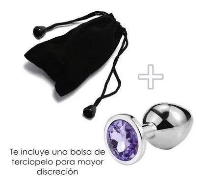 Plug anal chico con joya violeta junto a una bolsa negra.